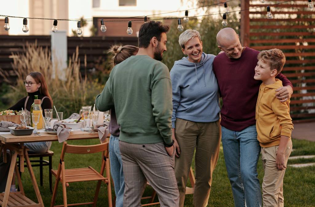Family enjoying a picnic bbq. 